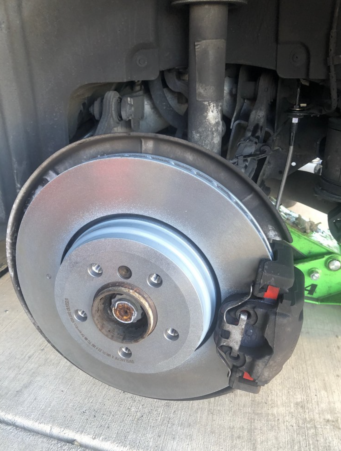 Brake rotor and caliper close-up for mobile brake repair